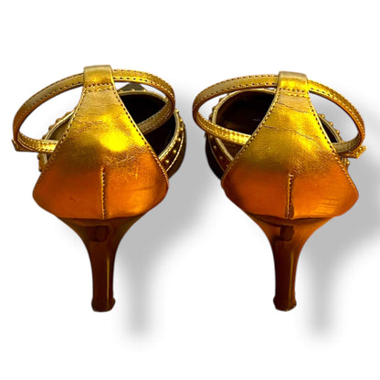 Escarpins dorés et noirs